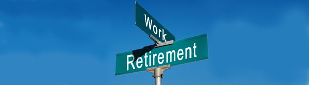 Photo: Crossroad signs of work and retirement
